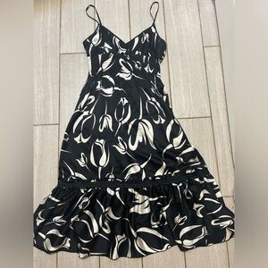 Bebe silk and spandex black floral dress, size small